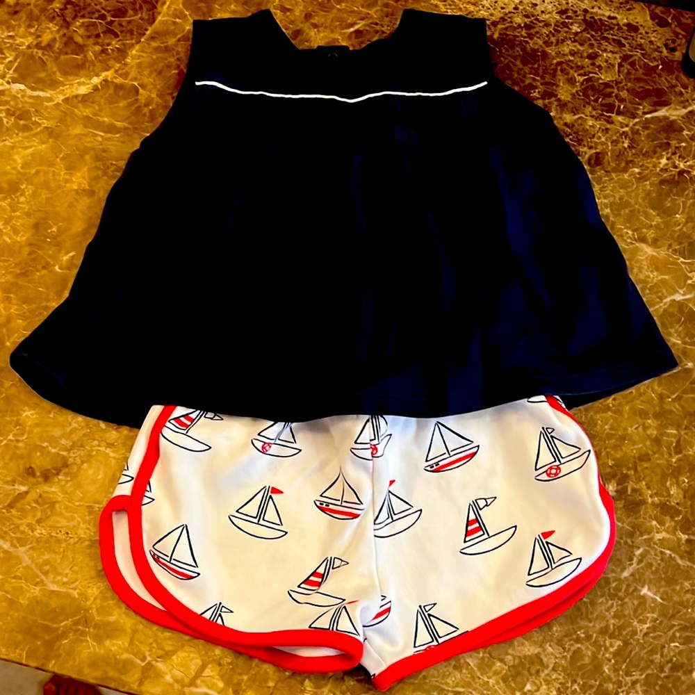 Beaufort Bonnet sailboat shorts and navy blue shirt